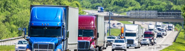 Horizontal shot of heavy traffic on the interstate highway.