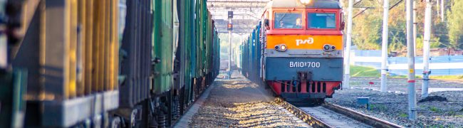 Kemerovo, Russia 27 august 2019. The Russian Railways train travels along a standing freight train